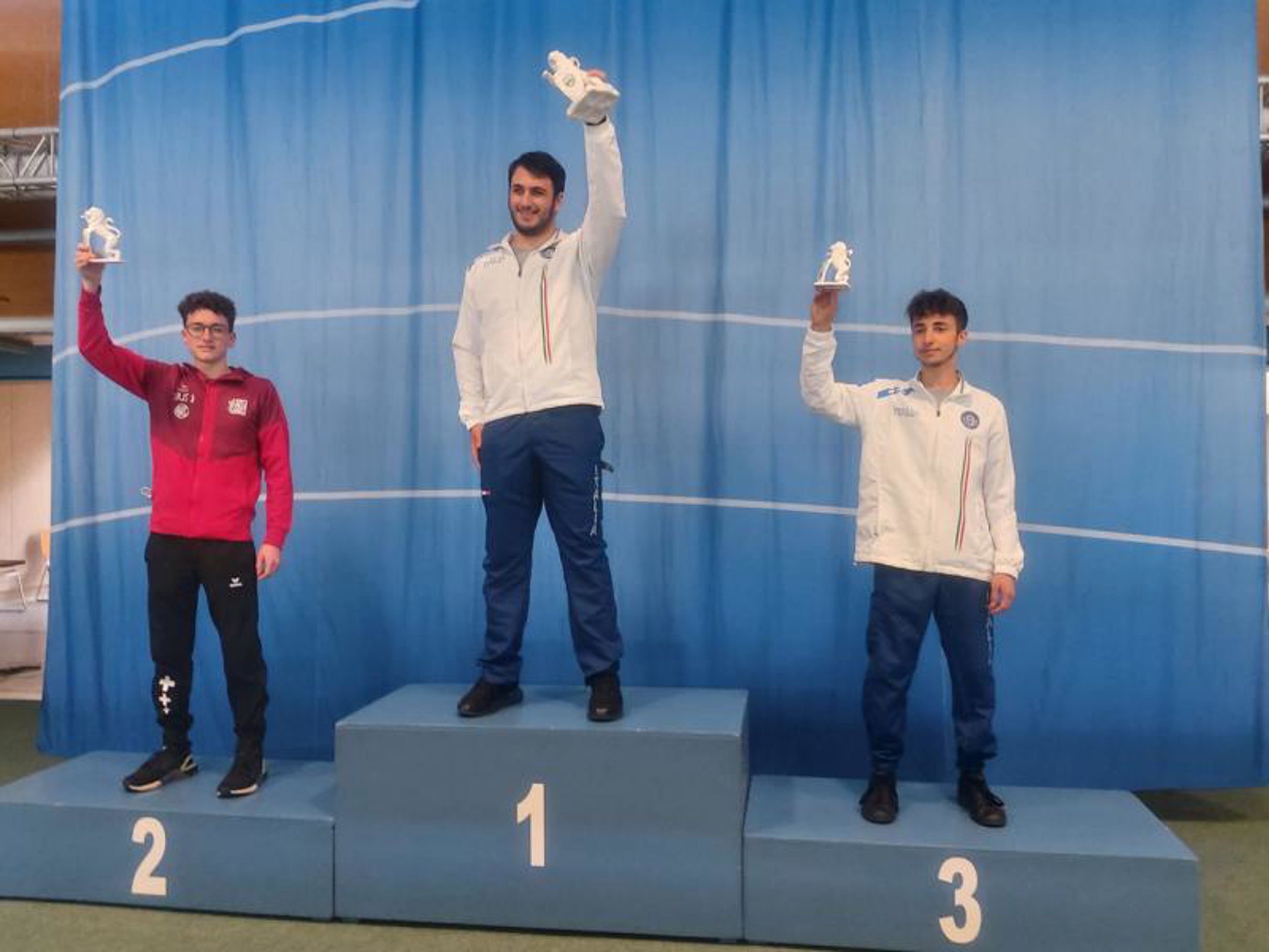 Das Podest Pistole 25m Junioren: 2. Jannis Bader, Gold und Bronze gingen an Federico Maldini und Michele Palella aus Italien